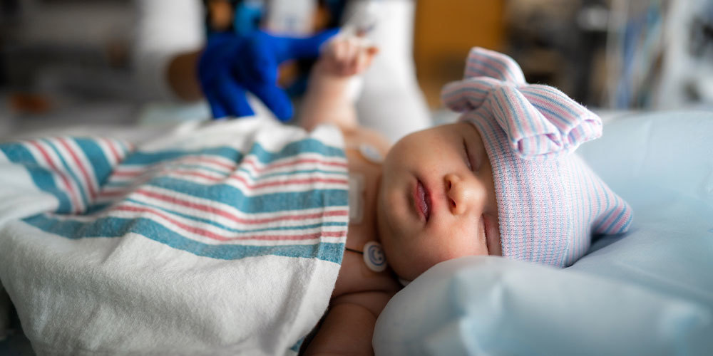 Baby sleeping after heart surgery