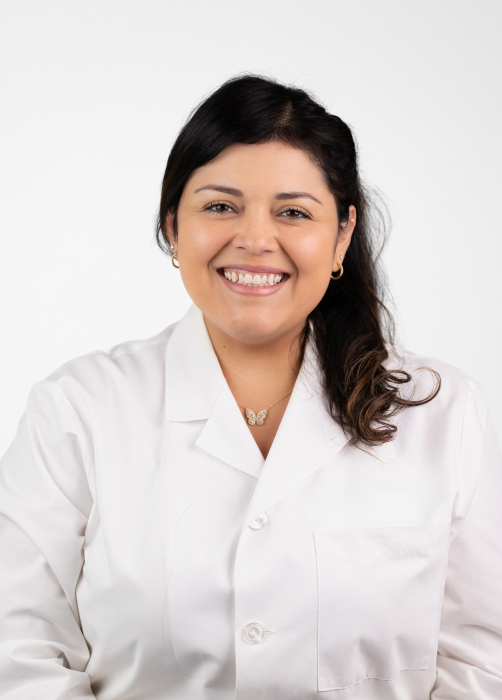 Headshot of Cindy Hernandez. She is wearing a white coat.