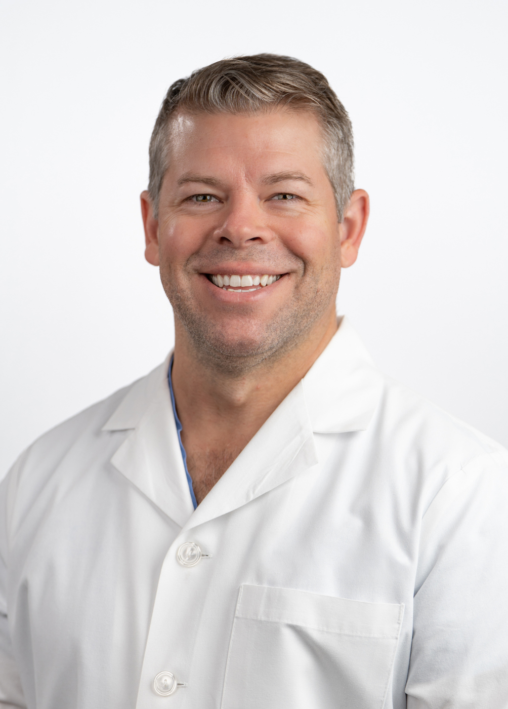 Headshot of Seiler Purdy. He is wearing a white coat.